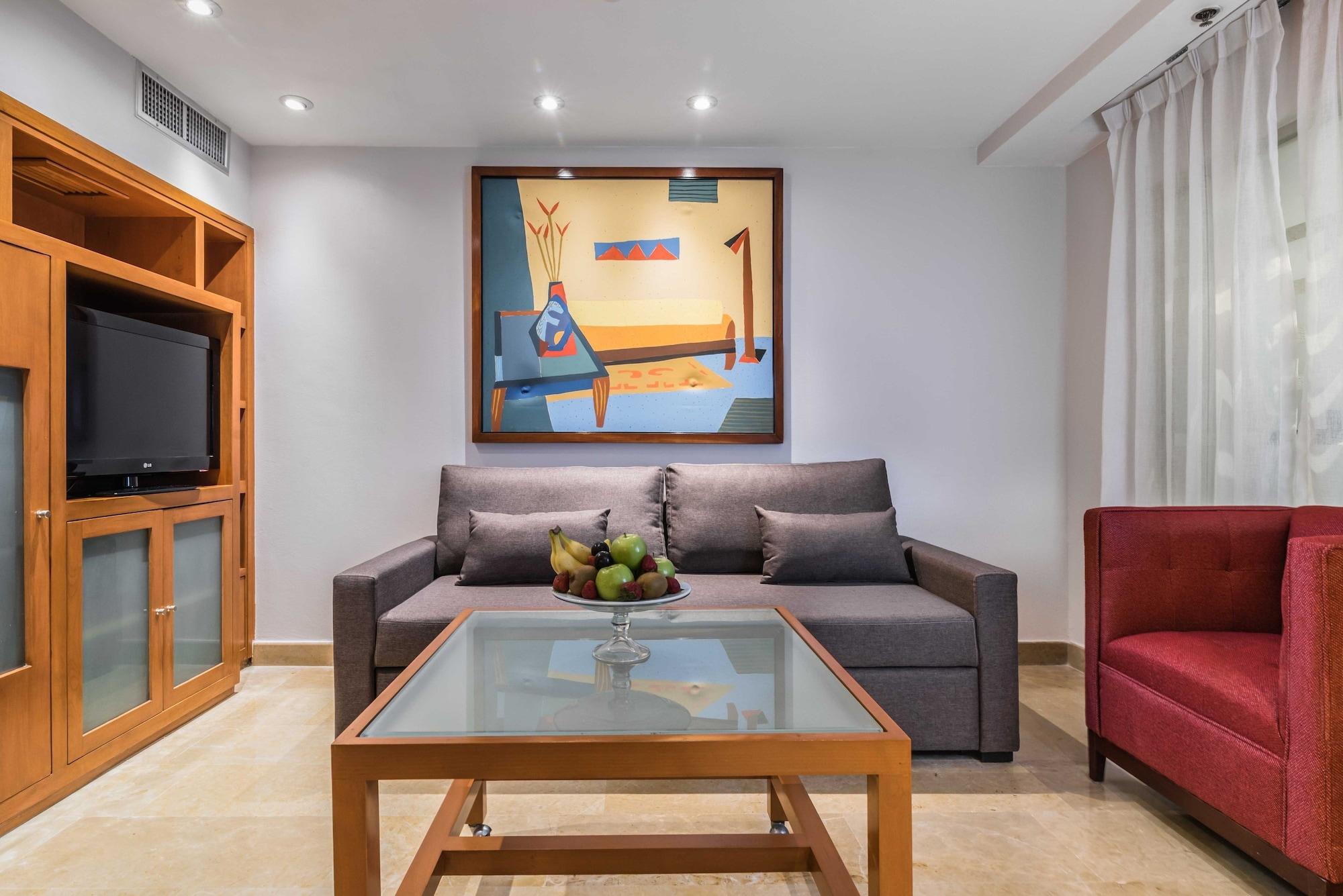 Eurostars Zona Rosa Suites Mexico City Luaran gambar A living room at the hotel